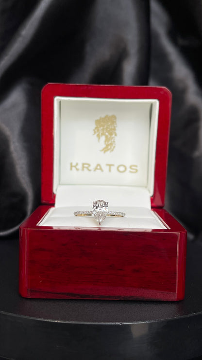 A. Compromiso pera .98ct laterales pave .13ct 14KYG
