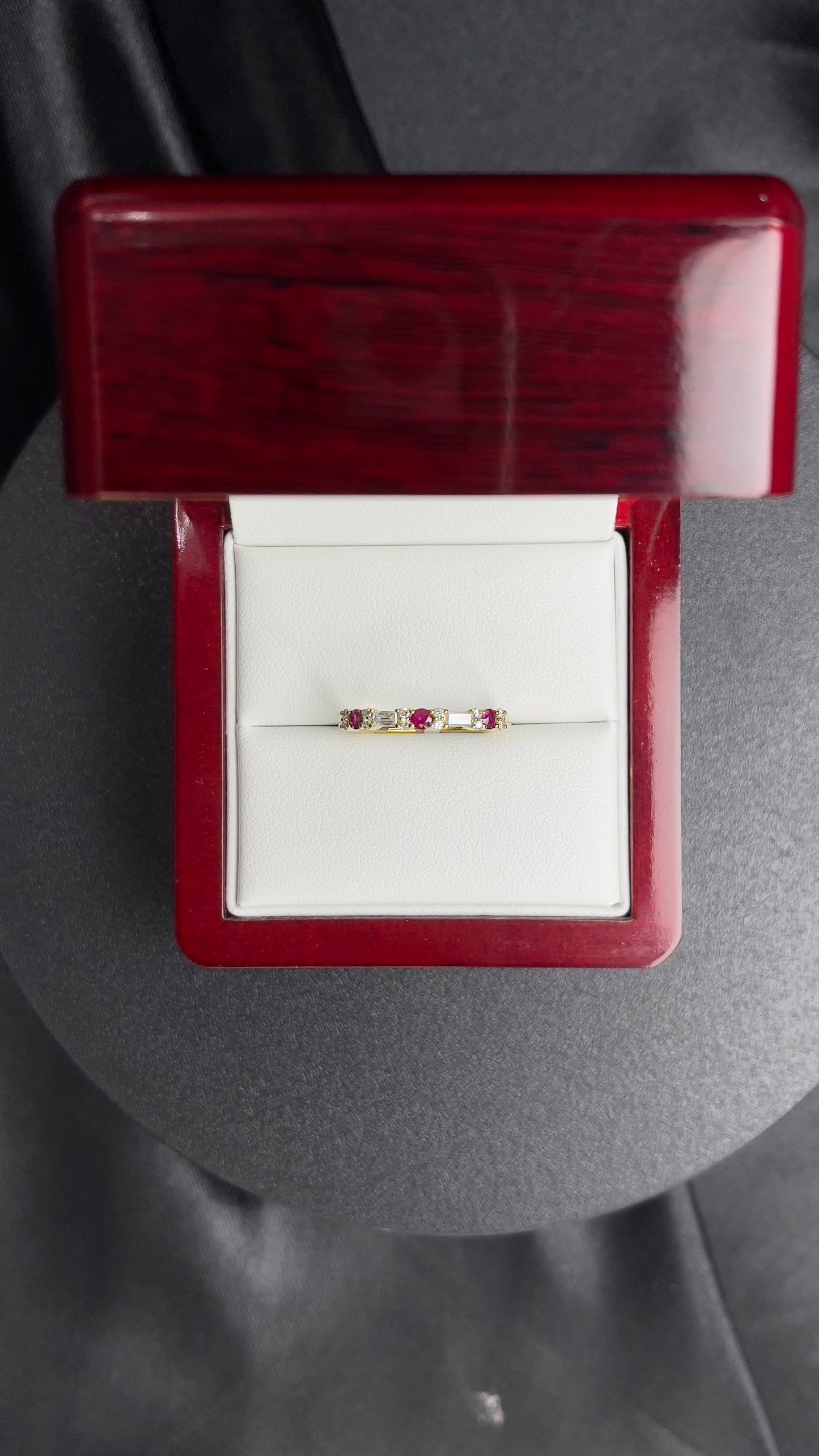 Churumbela Ruby .18ct, 12 rd 0.08ct , 2 Bg 0.11 ct, 14k