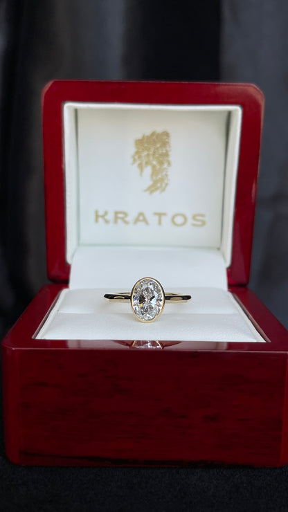 A. Compromiso Solitario Oval Bicelado YG 14k
